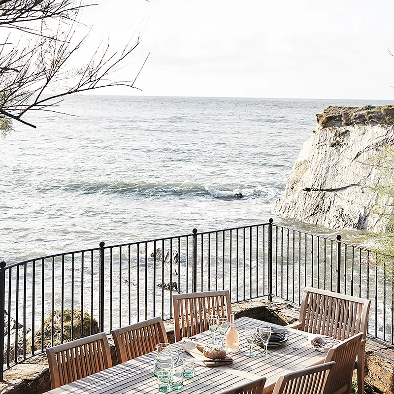 The Mill House terrace overlooking the bay